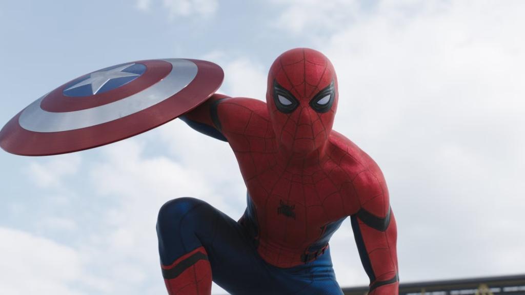 spider-man-holds-captain-america-s-shield-in-a-civil-war-publicity-still.jpg