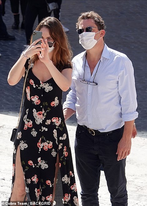 34286030-8830605-Working_together_A_source_told_MailOnline_that_Dominic_and_Lily_-m-93_1602497679307.jpg