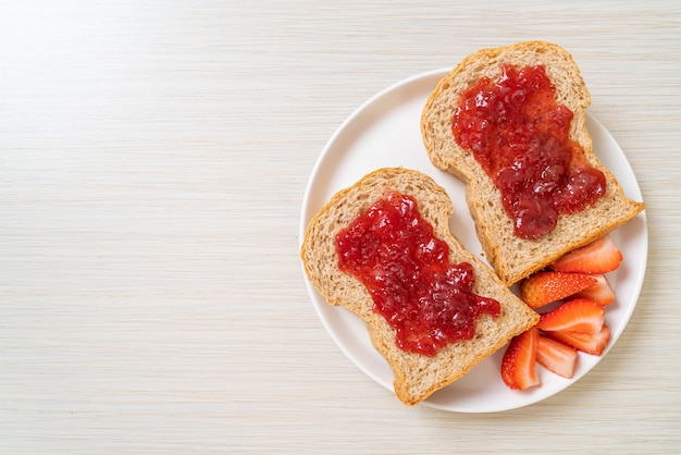homemade-whole-wheat-bread-with-strawberry-jam-fresh-strawberry_1339-124285.jpg