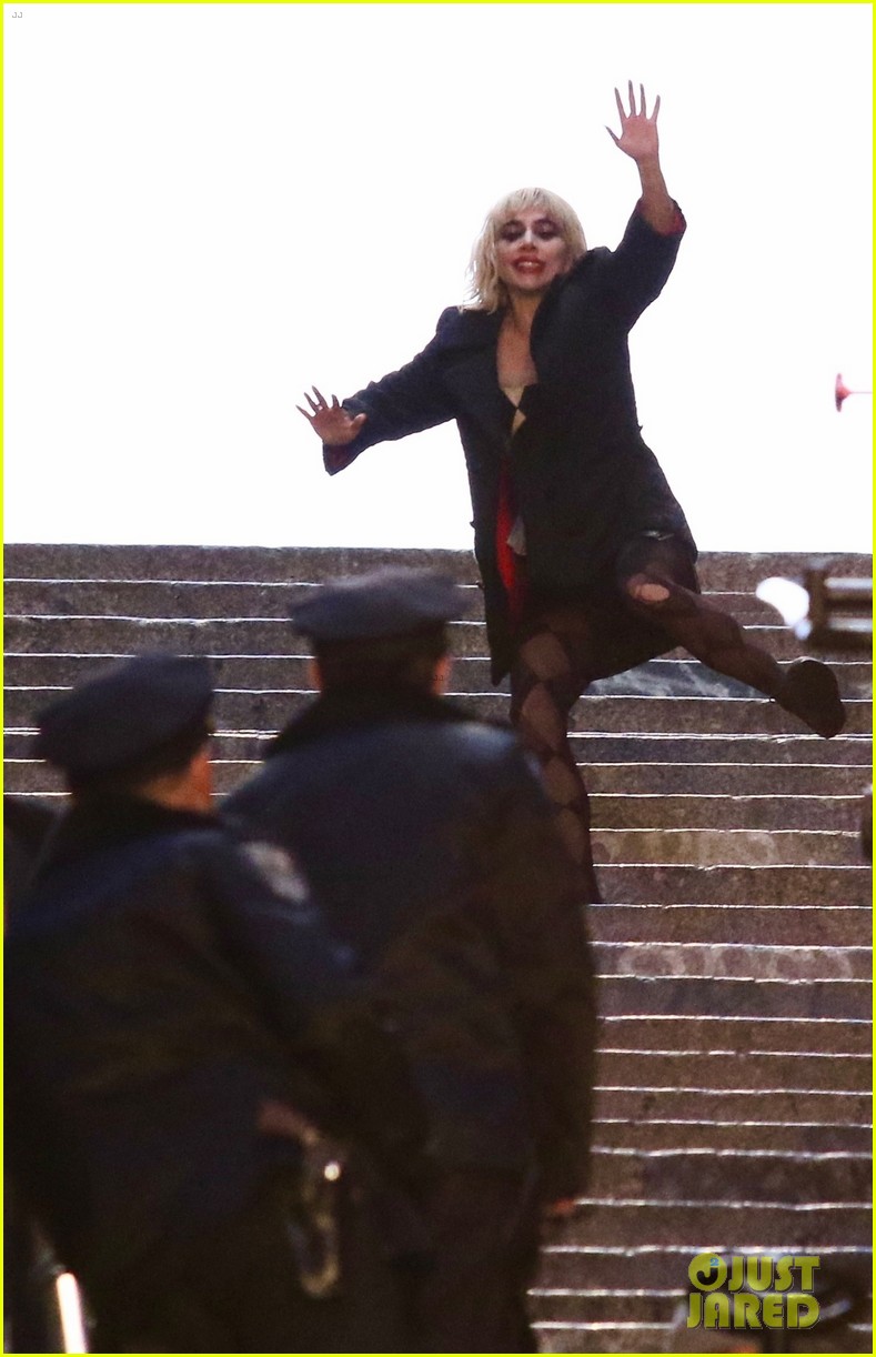 lady-gaga-joaquin-phoenix-song-dance-stairs-help-fall-over-14.jpg