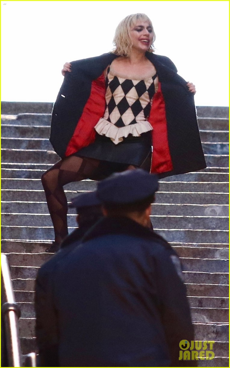 lady-gaga-joaquin-phoenix-song-dance-stairs-help-fall-over-11.jpg