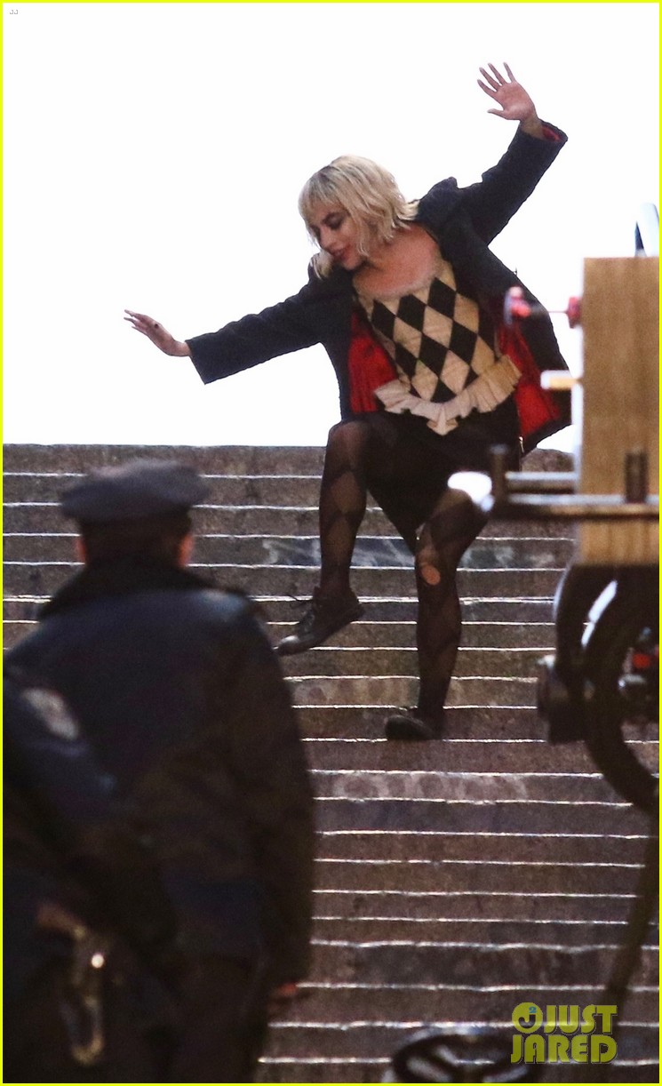 lady-gaga-joaquin-phoenix-song-dance-stairs-help-fall-over-13.jpg