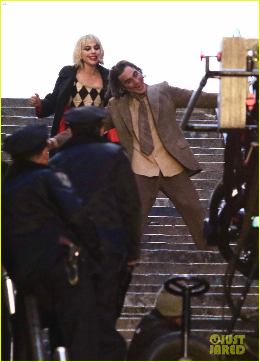 lady-gaga-joaquin-phoenix-song-dance-stairs-help-fall-over-05.jpg