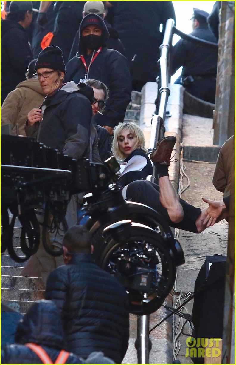 lady-gaga-joaquin-phoenix-song-dance-stairs-help-fall-over-03.jpg