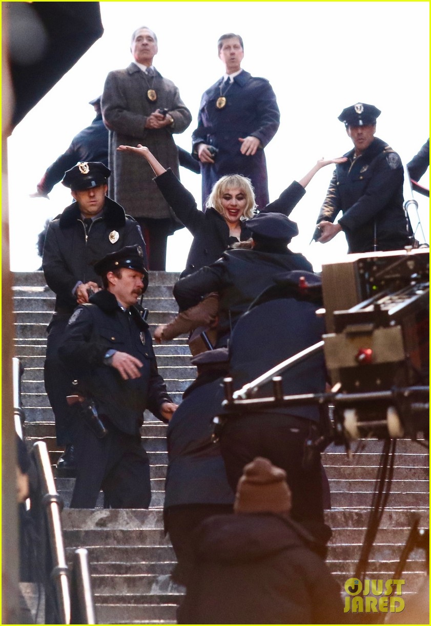 lady-gaga-joaquin-phoenix-song-dance-stairs-help-fall-over-15.jpg