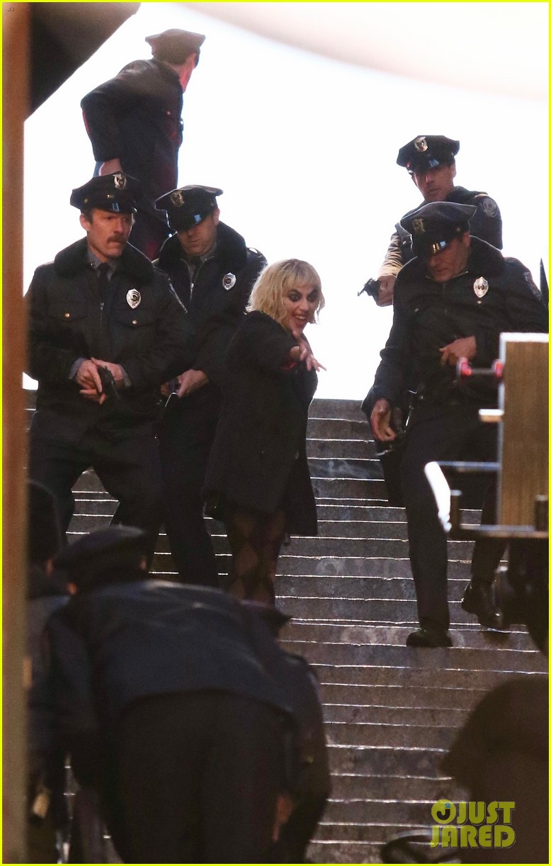 lady-gaga-joaquin-phoenix-song-dance-stairs-help-fall-over-36.jpg