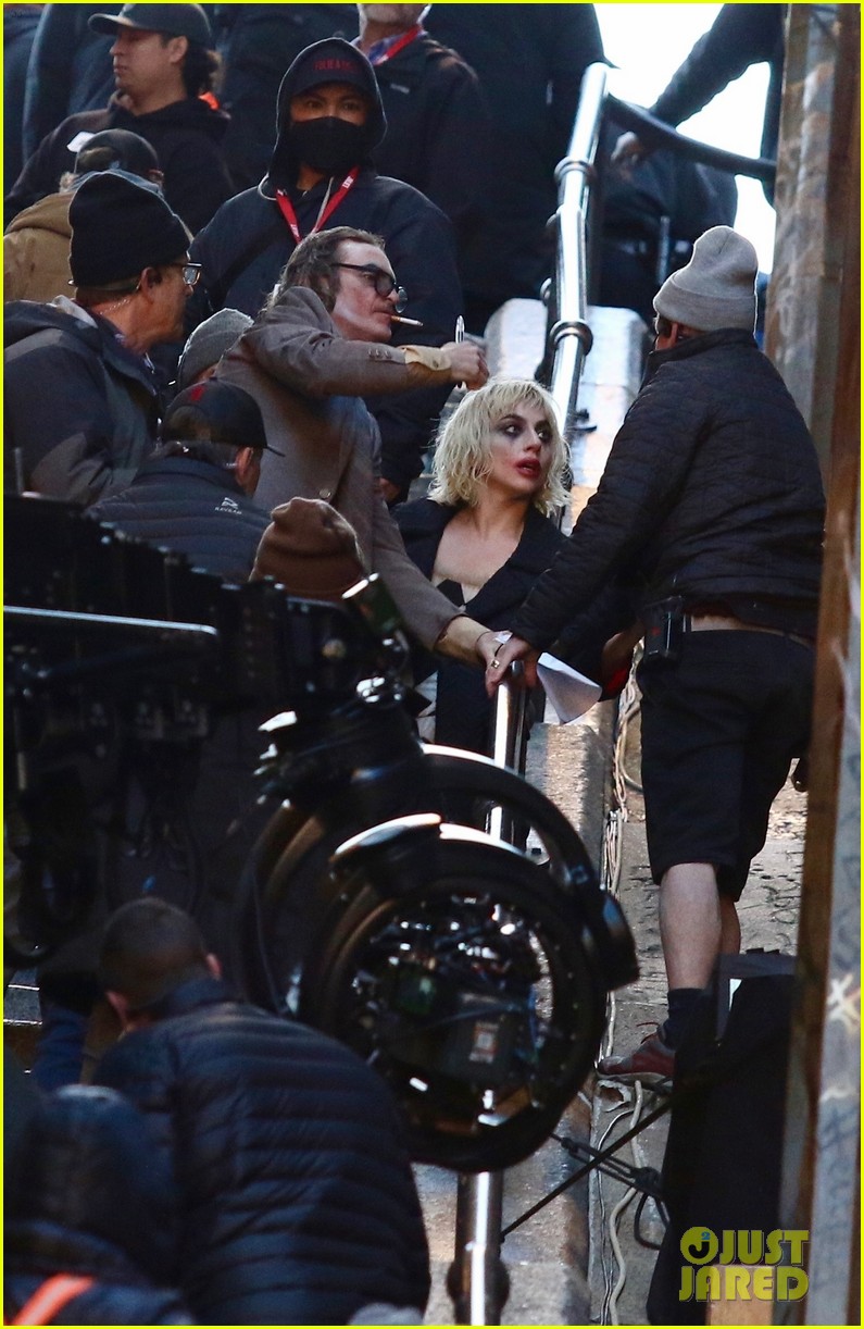 lady-gaga-joaquin-phoenix-song-dance-stairs-help-fall-over-04.jpg
