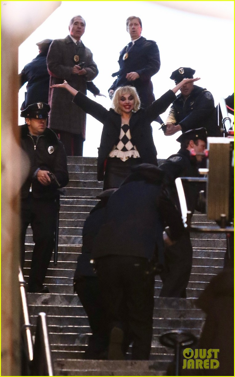 lady-gaga-joaquin-phoenix-song-dance-stairs-help-fall-over-20.jpg