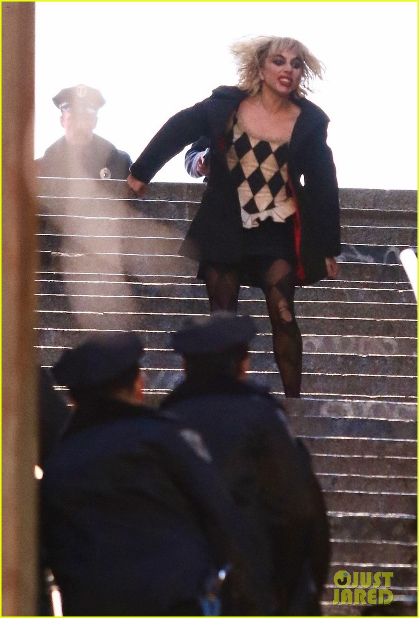 lady-gaga-joaquin-phoenix-song-dance-stairs-help-fall-over-30.jpg