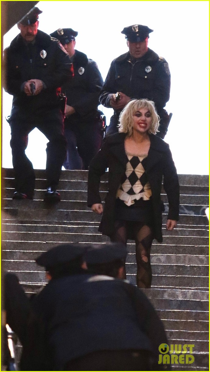 lady-gaga-joaquin-phoenix-song-dance-stairs-help-fall-over-18.jpg