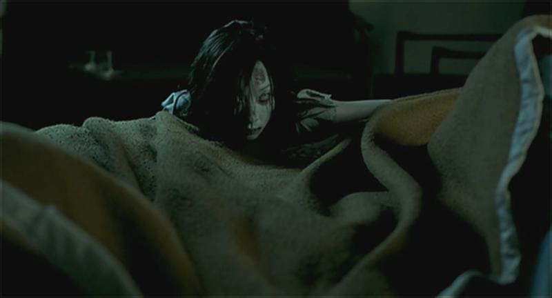 Shutter.2004.DVDRip.XviD.AC3.iNT.CD2-MoMo.avi_001541708.png.jpg