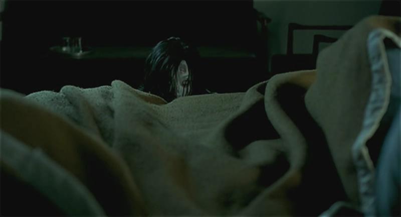 Shutter.2004.DVDRip.XviD.AC3.iNT.CD2-MoMo.avi_001531239.png.jpg