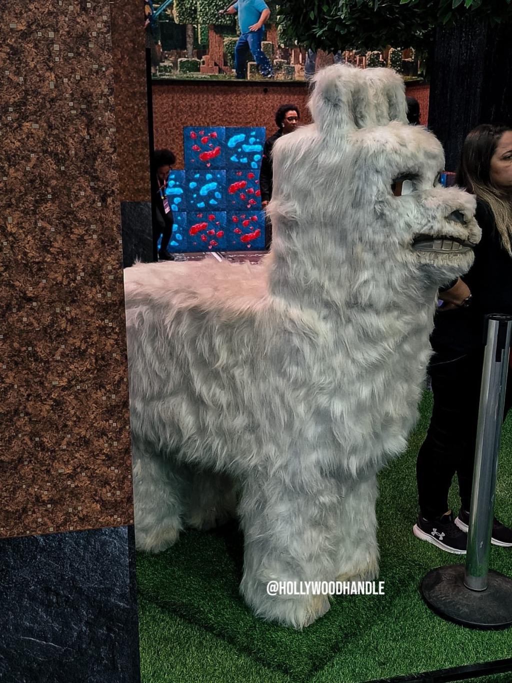 A llama at the ‘A MINECRAFT MOVIE’ standee at #CCX.jpg