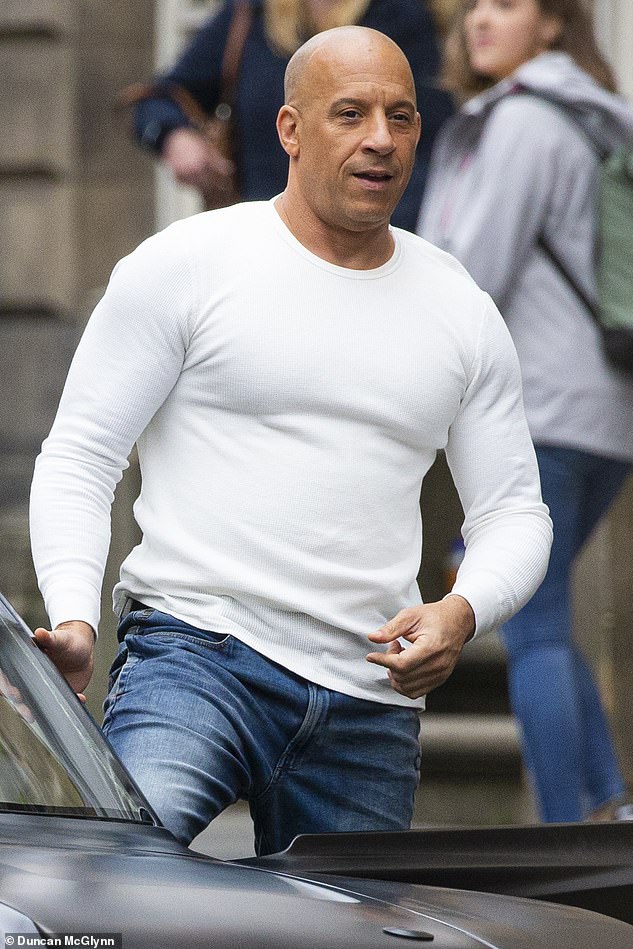 18313210-7494635-Dominic_s_back_Vin_Diesel_looked_ready_for_a_day_of_action_packe-a-408_1569245685977.jpg