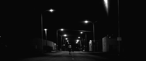 a girl walks home alone at night -skateboard.gif