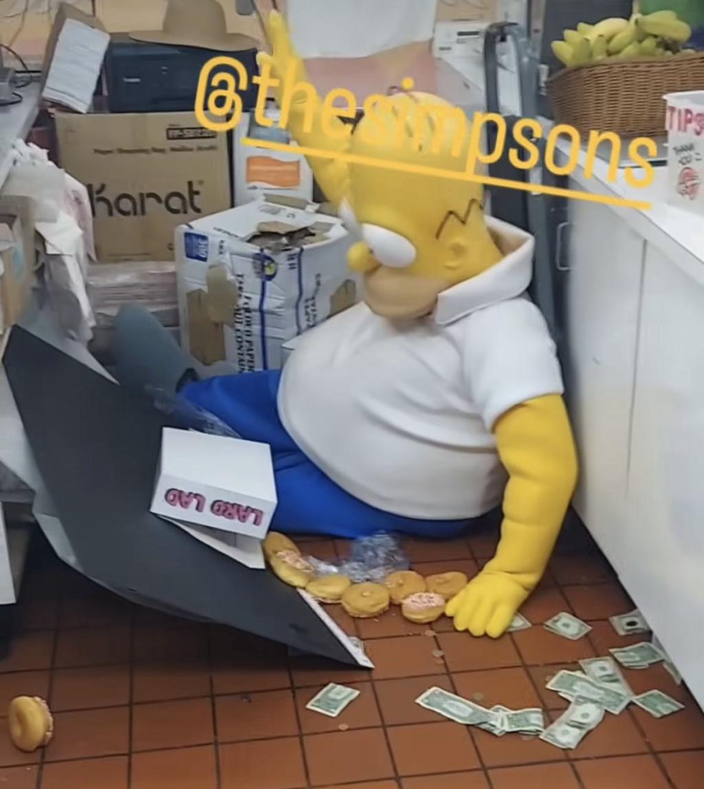 A group of Homers have taken over a donut shop in .jpg