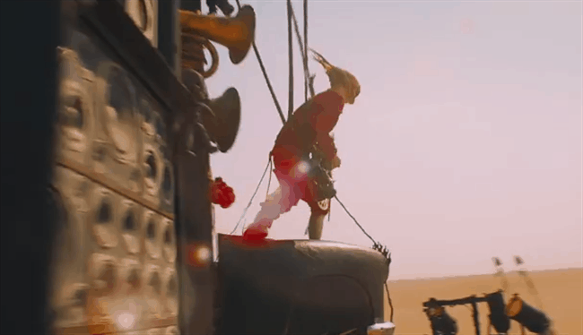 mad-max-fury-road-awesome-guitar-guy-1431710473.gif