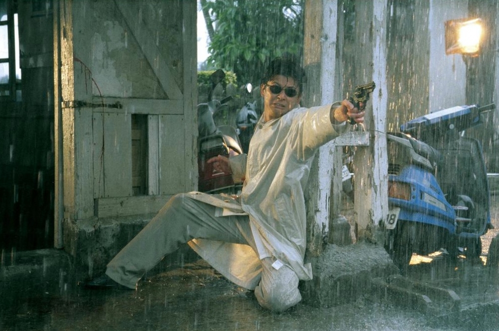rainy-dog-1997-001-rain-sunglasses-scooters-revolver.jpg