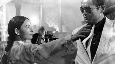 history-of-a-mans-face-1966-001-man-sunglasses-woman-looking-in-the-eyes.jpg